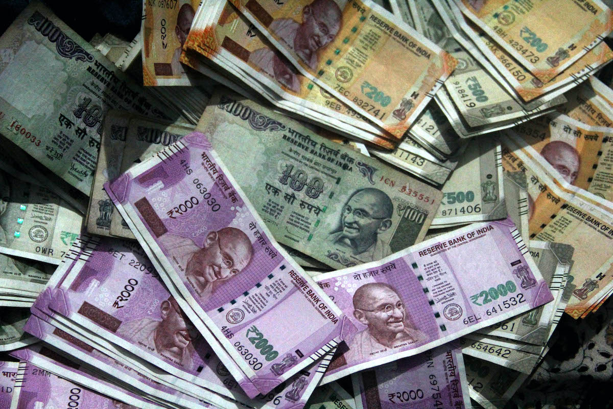 Rupee Averts Record Low on Likely RBI Intervention Amid Local Equities Slide